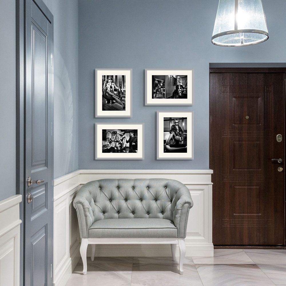 Four black and white limited edition photographs by Marco Tenaglia displayed in a stylish home entrance.
